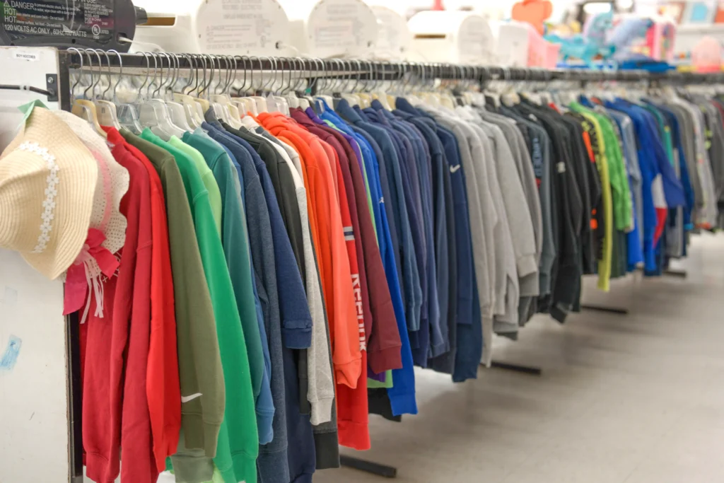 Colorful boys’ hoodies, sweatshirts, and activewear arranged on a clothing rack at the Harrisburg location.