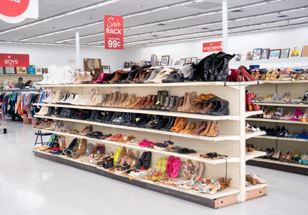 Large selection of women’s boots, heels, flats, and sandals displayed inside the Value World Antoine store.