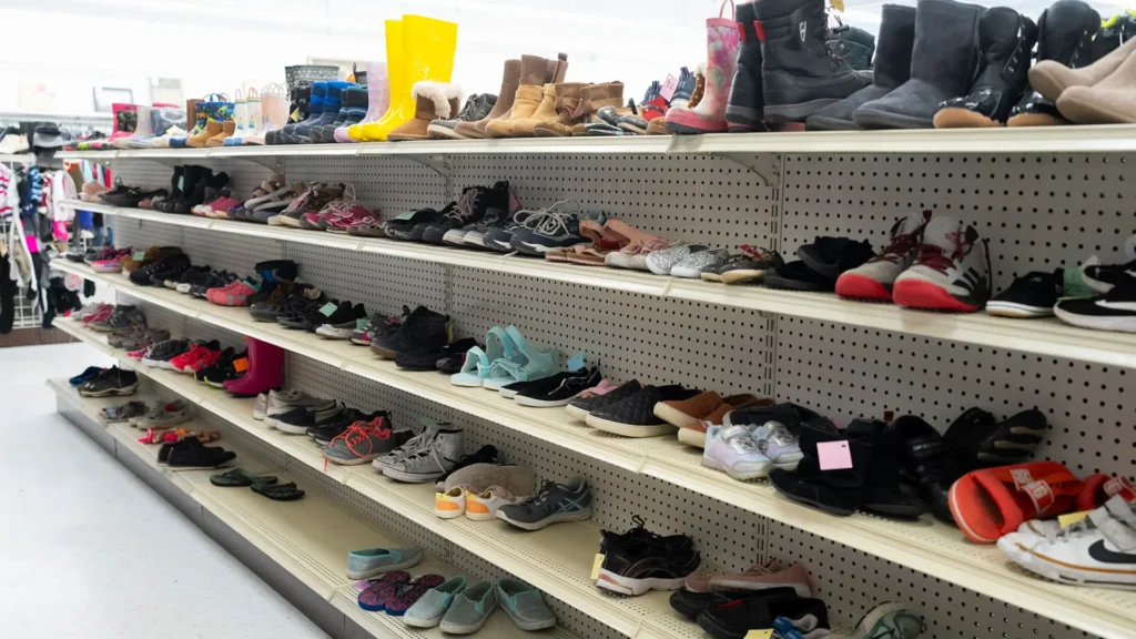 Rows of secondhand children’s shoes and boots at Value World in North Olmsted, Ohio